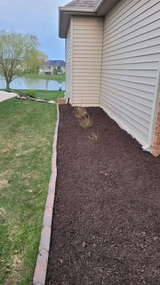 Custom landscape installation for beautiful yards across Fort Wayne, IN - Grass Crafters