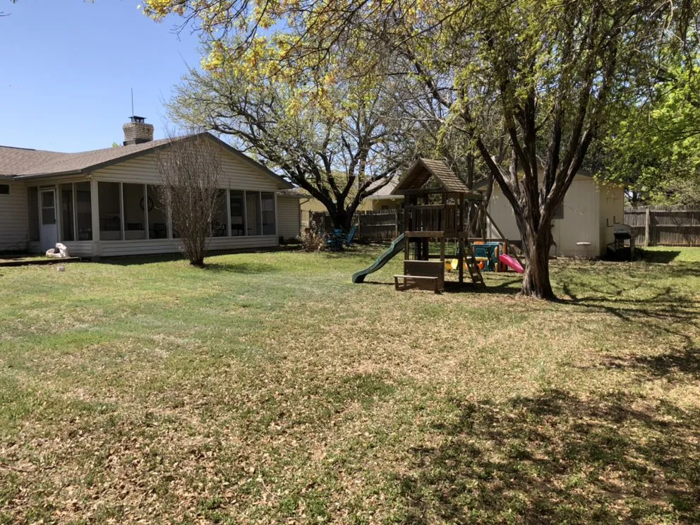Custom residential landscaping in Brazos Bend, TX by Grass Daddy