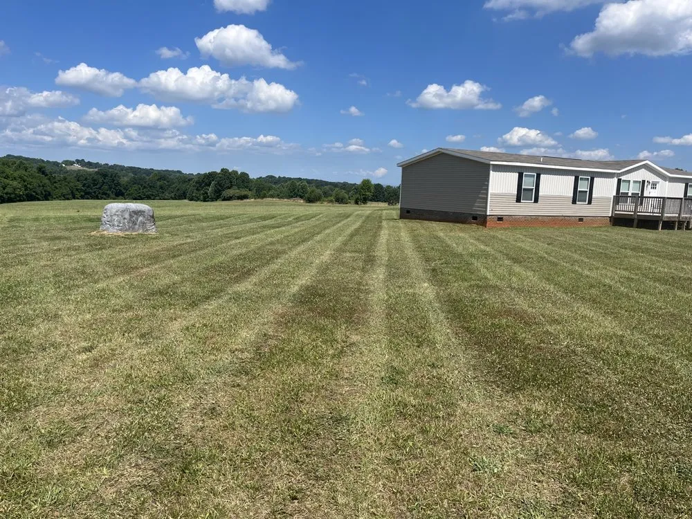 Expert landscape design for residential properties in Iron station, NC by Grass Daddy’s