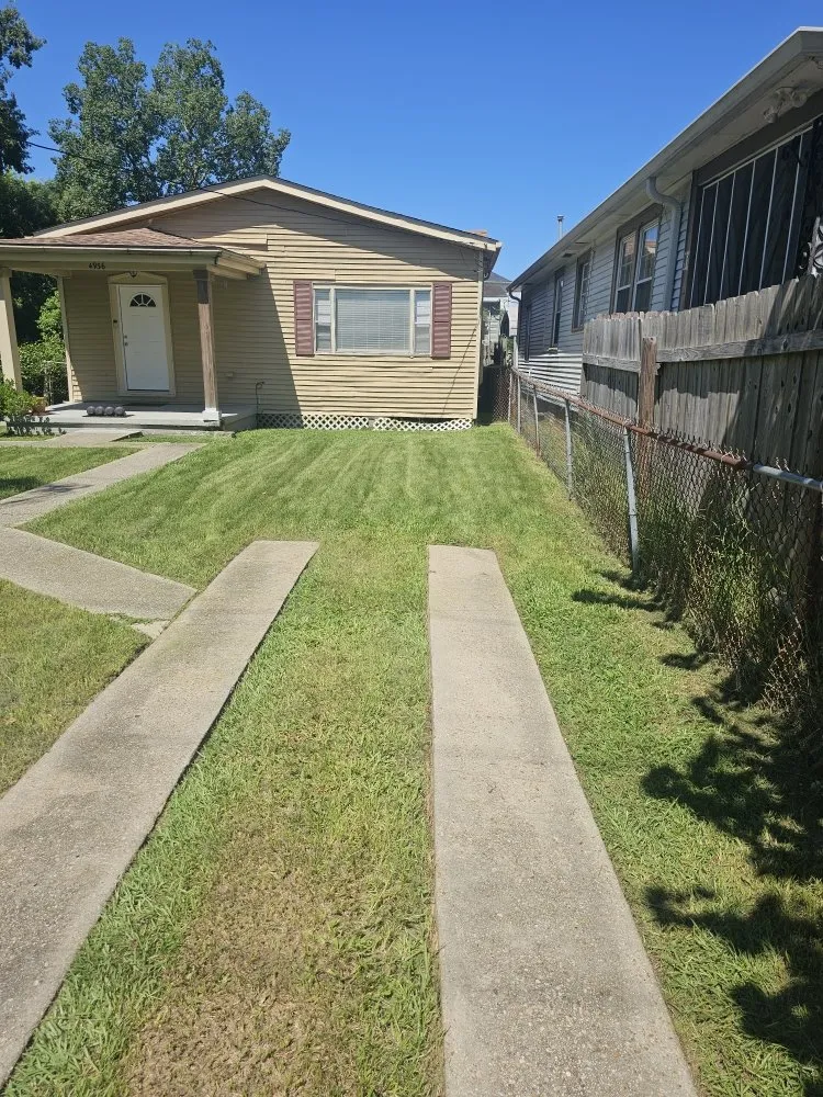 Affordable lawn mowing service for homes in New Orleans, LA by Grass Genie