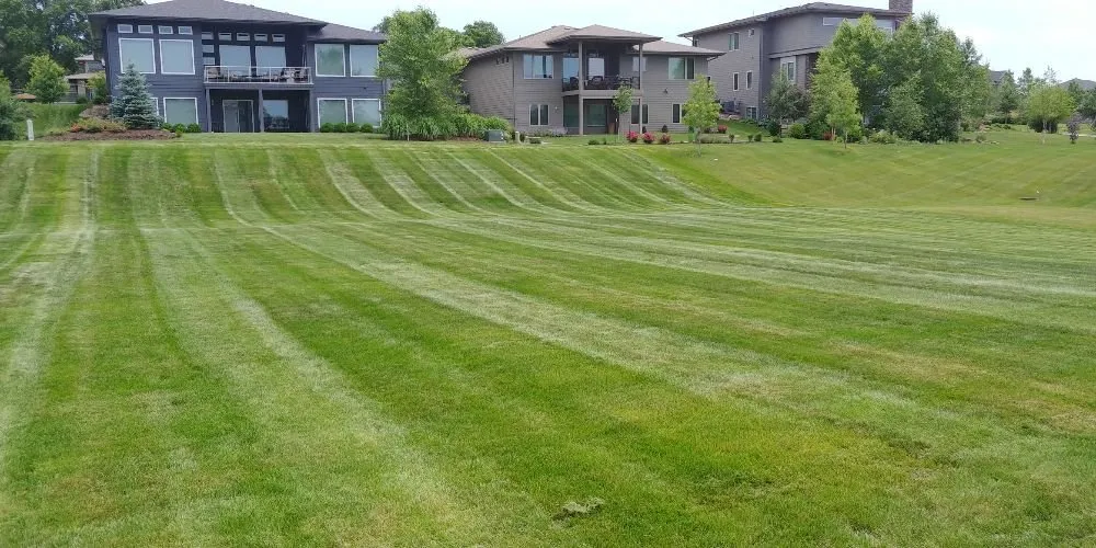 Affordable garden landscaping for year-round maintenance across Des Moines, IA - GRASS GRABBERS Lawn & Landscape