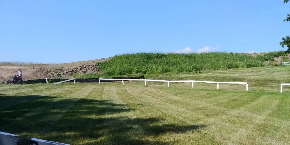 Professional yard maintenance for beautiful yards in Des Moines, IA by GRASS GRABBERS Lawn & Landscape