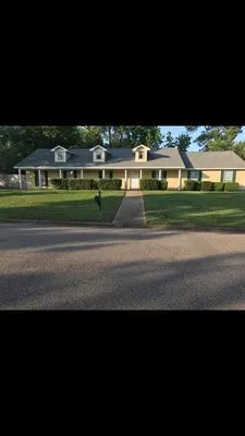 Grass Grazers Lawn Care Logo