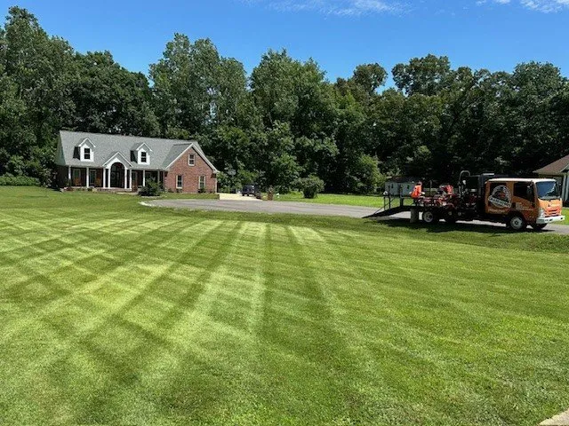 Affordable landscape design for year-round maintenance in Munford, TN by Grass Gurus & Services