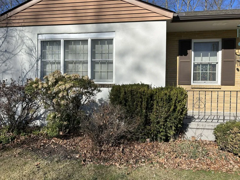 Professional yard cleanup service for residential properties in Quakertown, PA by Grass Gurus