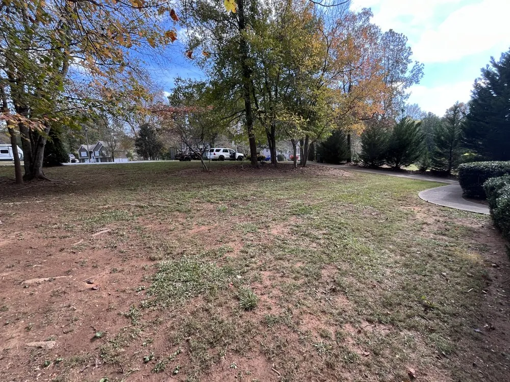 Professional lawn care service for residential properties in Dallas, GA by Grass Kicker Lawn Care