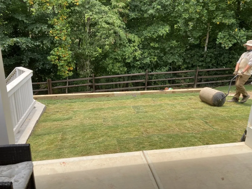 Custom garden landscaping with custom design in Dallas, GA by Grass Kicker Lawn Care