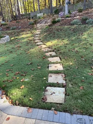 Grass Kicker Lawn Care Logo