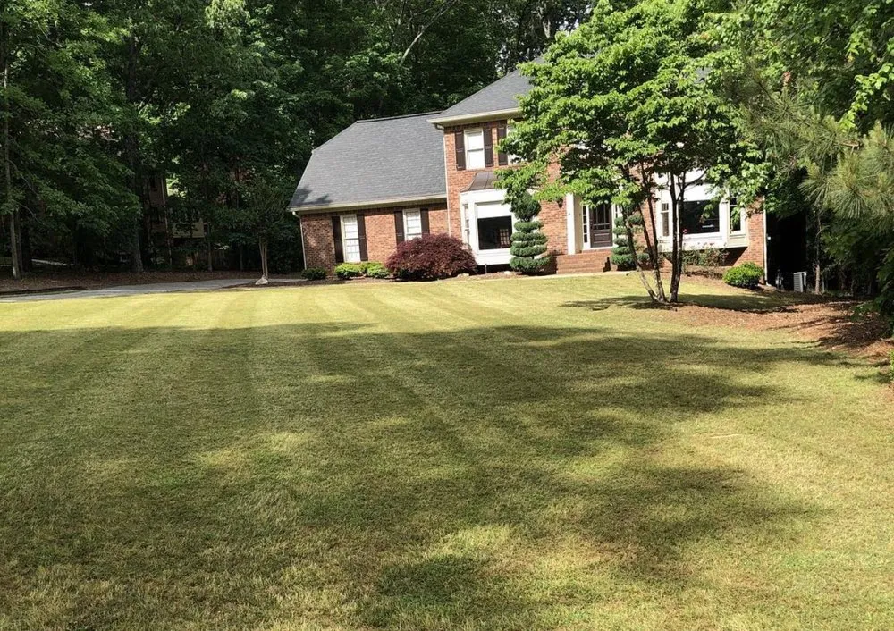 Professional residential landscaping in Fayetteville, GA by Grass Kicking Landscaping