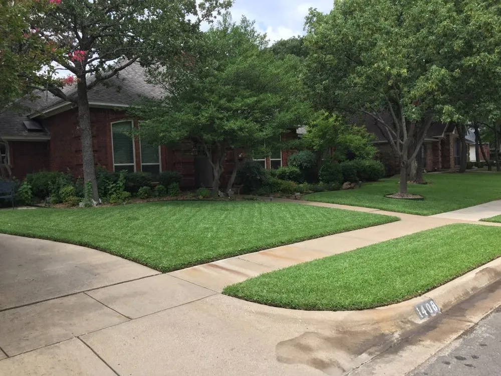Professional garden landscaping for residential properties in Keller, TX by Grass King