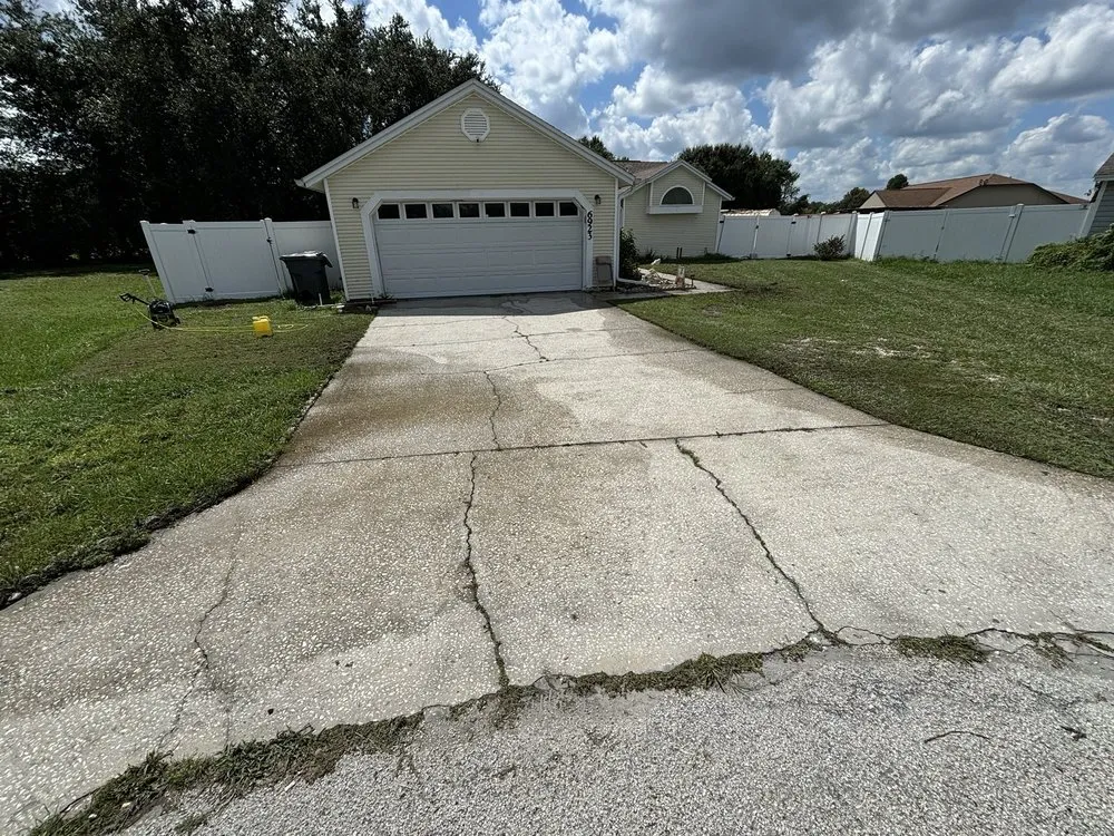 Custom lawn mowing service for homes in Lakeland, FL by Grass Masters