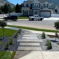 Custom landscape installation in Layton, UT by Grass Masters Landscapes & Zeroscaping