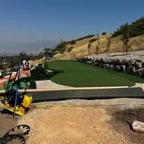 Reliable yard maintenance with custom design in Layton, UT by Grass Masters Landscapes & Zeroscaping