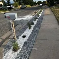 Custom landscape installation in Layton, UT by Grass Masters Landscapes & Zeroscaping