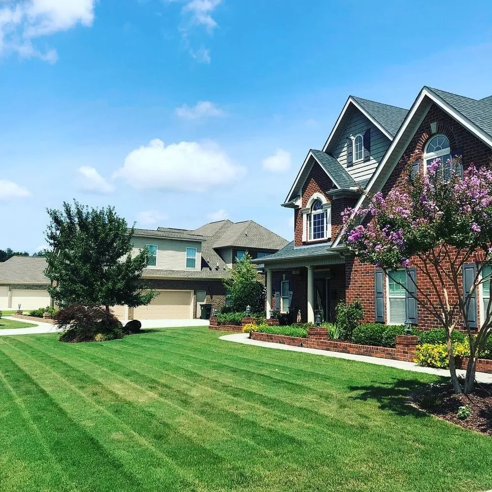 Custom landscape design for residential properties across New Market, AL - Grass Monkeys Lawn Care