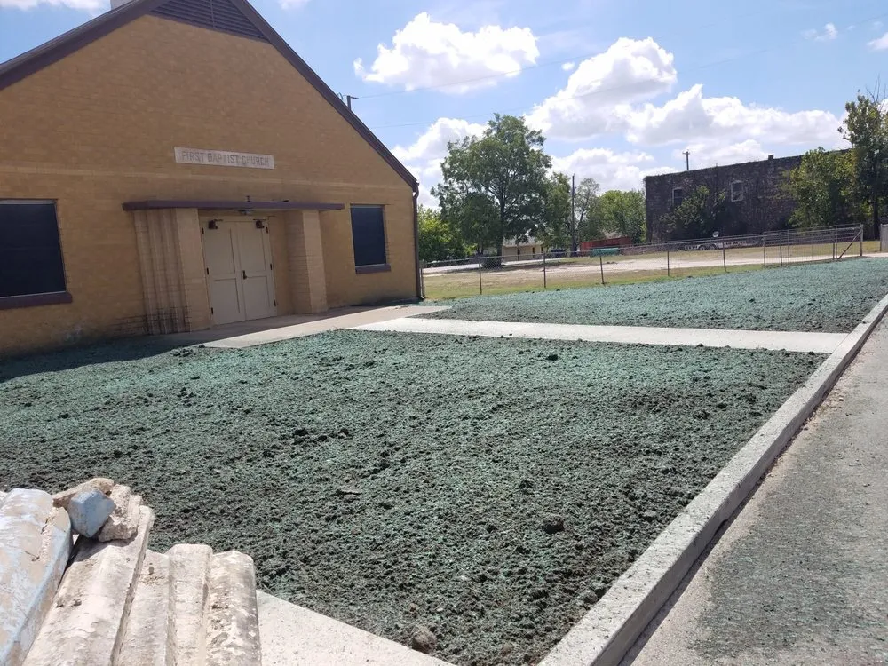 Local yard maintenance with custom design in Bryan, TX by Grass Roots HydroSeeding