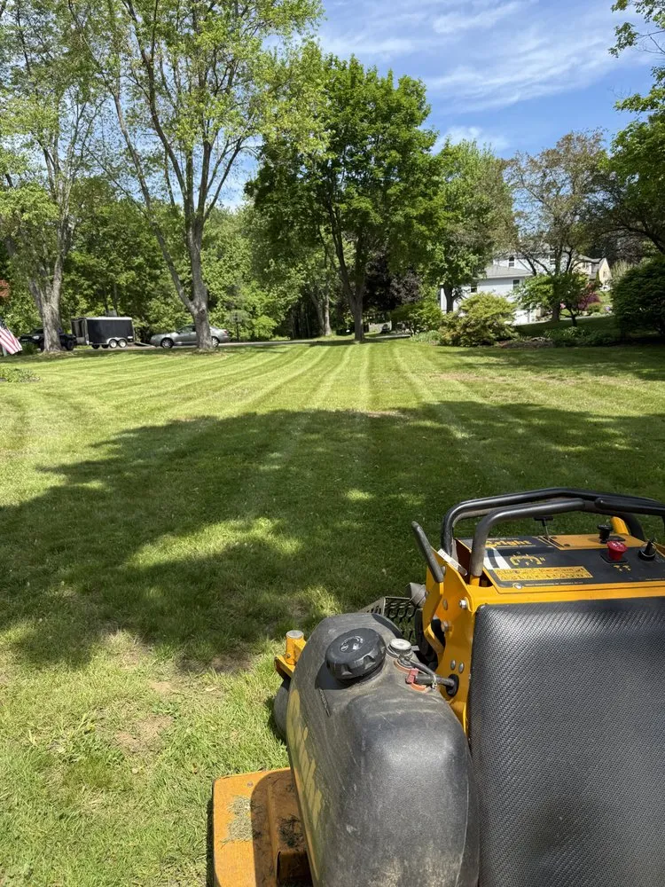 Custom outdoor landscaping with custom design across West Newbury, MA - Grass Roots Landscaping