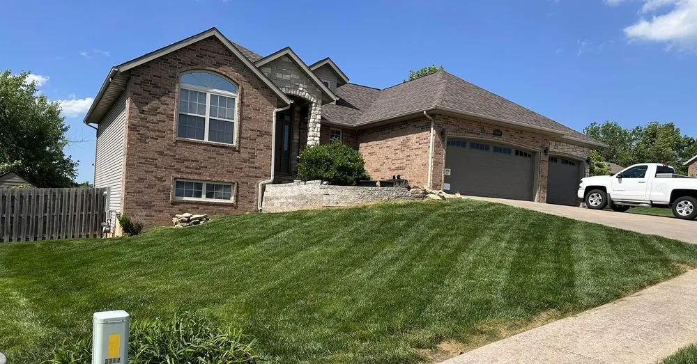 Reliable yard maintenance with custom design in Nixa, MO by Grass Roots Property Solutions