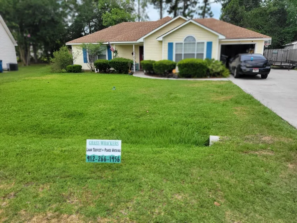 Affordable yard cleanup service for year-round maintenance in Brunswick, GA by Grass Whackers