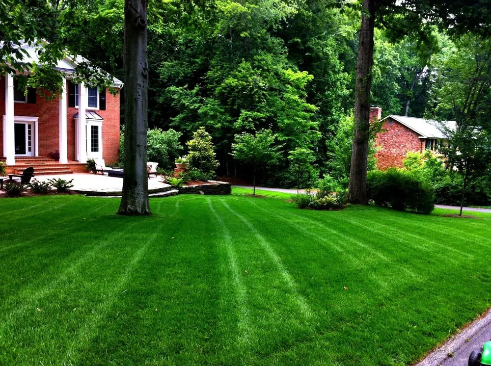 Custom garden landscaping with custom design in Crownsville, MD by Grassbusters Landscaping