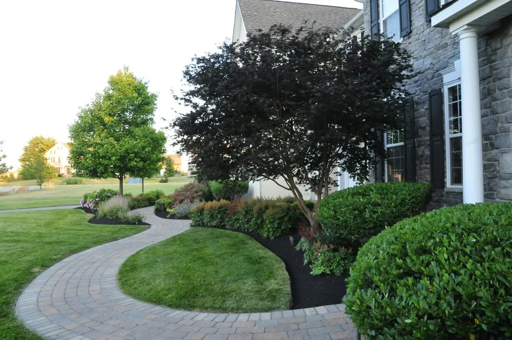 Custom yard maintenance in Monroe, NC by GrassChopper Landscaping