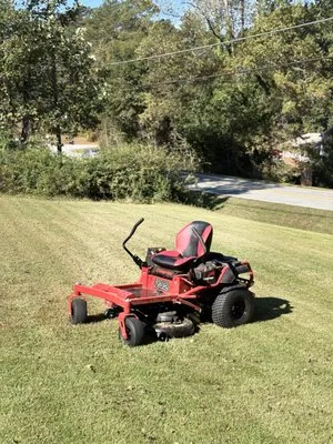 Grasshole Lawn Services Logo