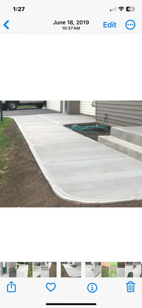 Custom residential landscaping in Cicero, NY by Grasshopper Concrete Services