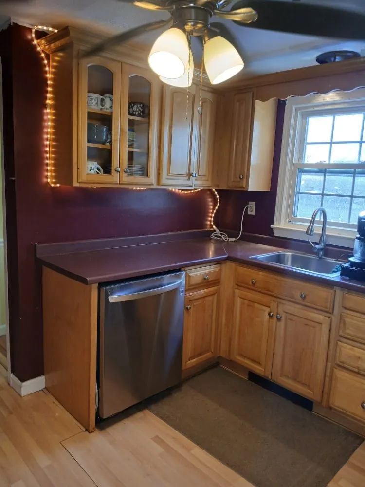 Local yard cleanup service for year-round maintenance in Dracut, MA by Grasshopper Lawn Care & Painting