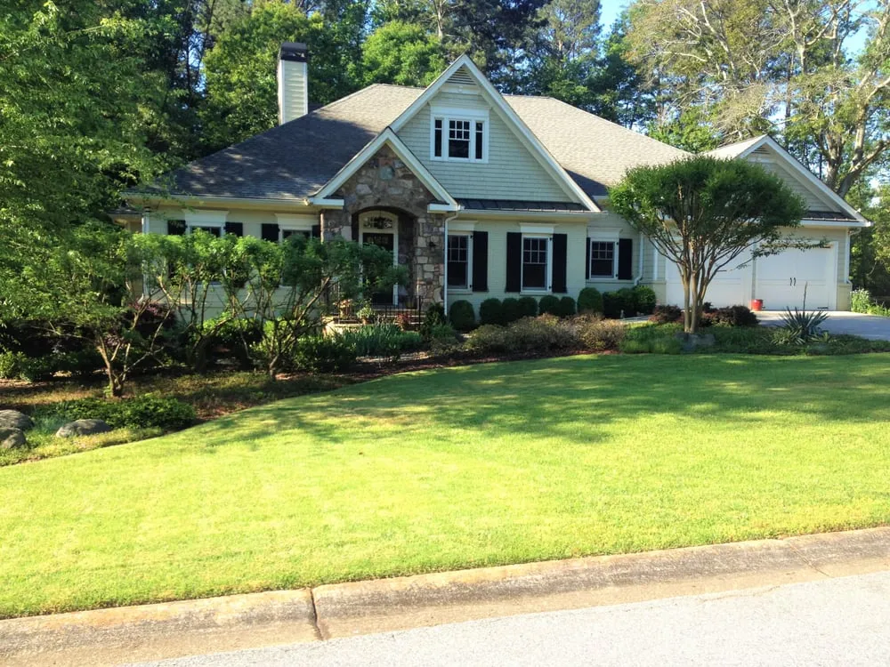 Affordable lawn mowing service for residential properties in Lilburn, GA by Grasshopper Lawn Care