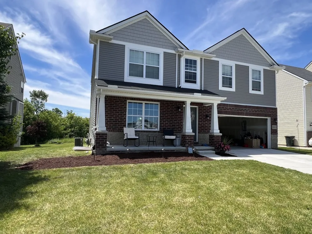 Affordable landscape installation for residential properties in St. Clair Shores, MI by Grassland
