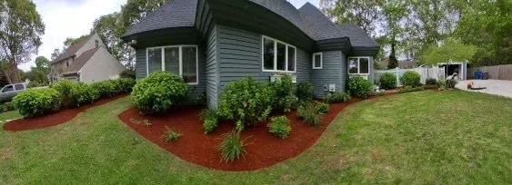 Custom outdoor landscaping with custom design across Mashpee, MA - Grasso’s Landscape Construction