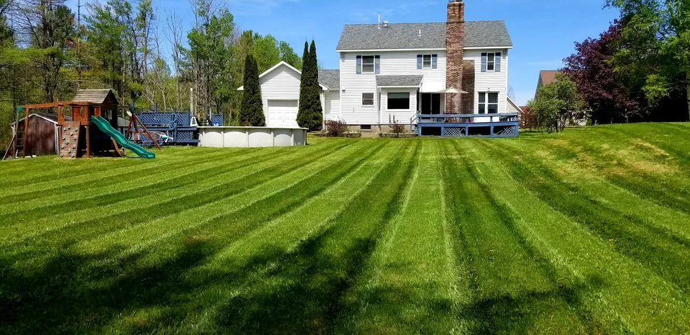 Reliable lawn mowing service for residential properties across Mayfield, NY - Grassroots Lawn Specialists