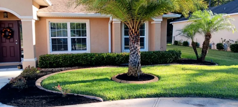 Custom lawn mowing service in Palm Coast, FL by Graves Landscaping And Design