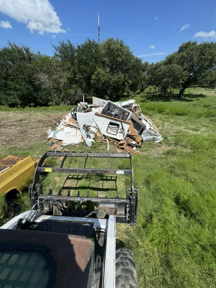 Affordable yard maintenance for homes in Cleburne, TX by Gray Dog Contracting