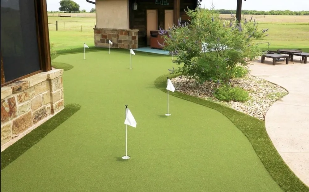 Professional lawn mowing service for homes in The Hills, TX by Gray Lang