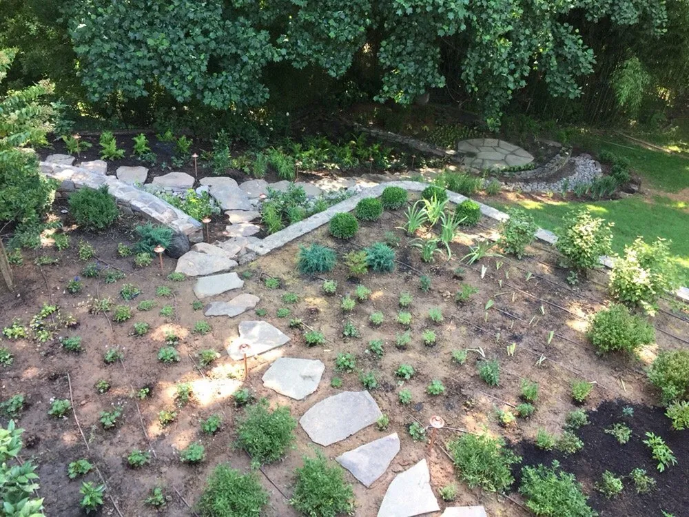 Affordable garden landscaping with custom design in Clarksburg, MD by Great American Landscapes