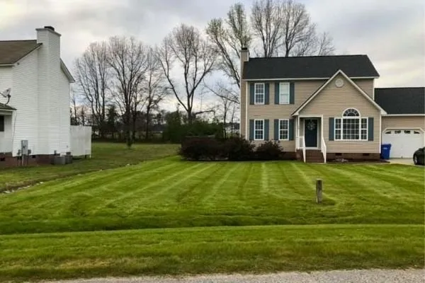 Expert yard maintenance with custom design across Fuquay-Varina, NC - Great Expectations Lawn and Landscape
