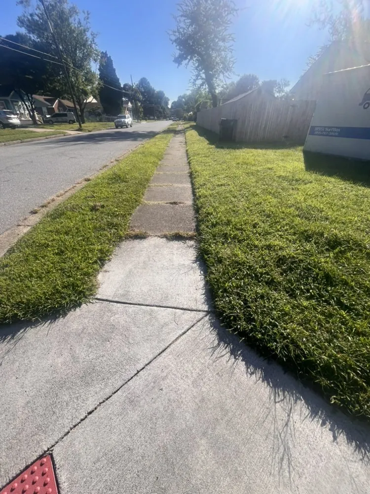 Custom lawn care service for homes in Virginia Beach, VA by Greatscape’s Yard Maintenance Professionals