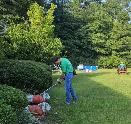 Green Acres Grass Cutting Logo