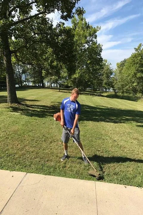 Professional lawn mowing service in Mitchell, IN by Green Acres Lawn Care