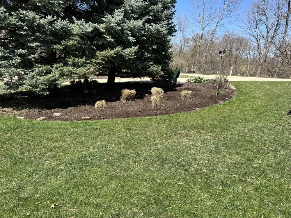 Expert yard maintenance for residential properties in Cedar Rapids, IA by Green Axis