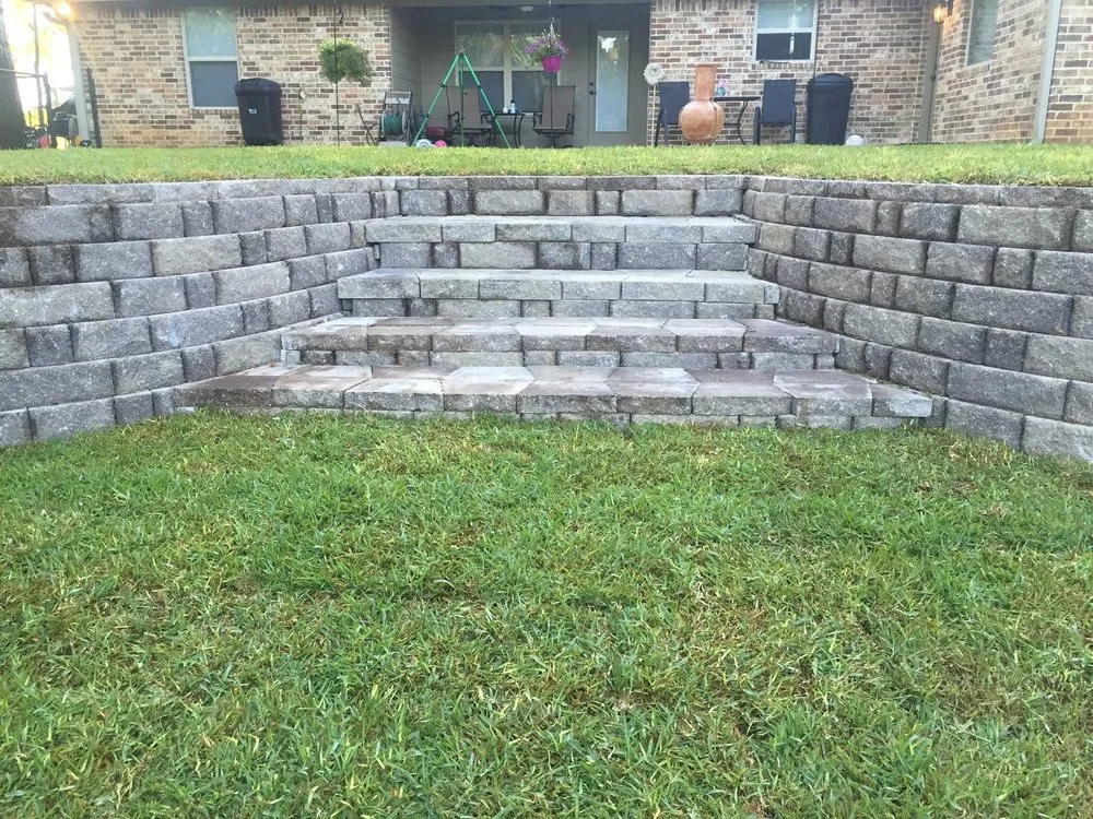Custom outdoor landscaping with custom design in Winona, TX by Green Blade Irrigation & Landscape