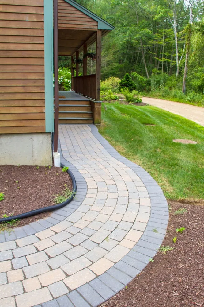 Professional lawn mowing service for residential properties in Sturbridge, MA by Green Boys Landscapes