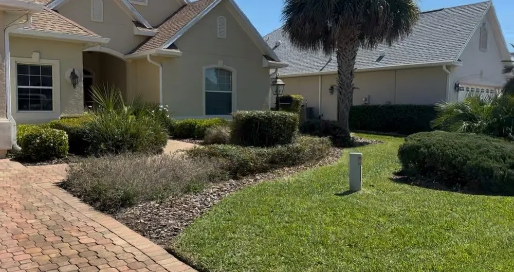 Professional yard maintenance for residential properties in Ocala, FL by Green Canopy