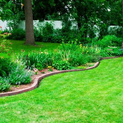 Custom lawn mowing service for beautiful yards in Ogden, UT by Green Castle Lawn Care and Pest Control