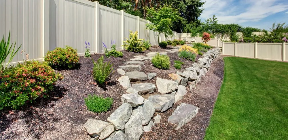 Local yard maintenance with custom design in Ogden, UT by Green Castle Lawn Care and Pest Control