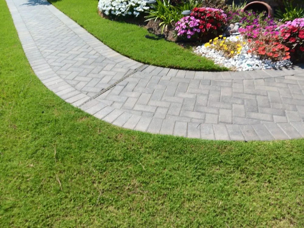 Affordable lawn mowing service with custom design in Lacombe, LA by Green Day Landscaping