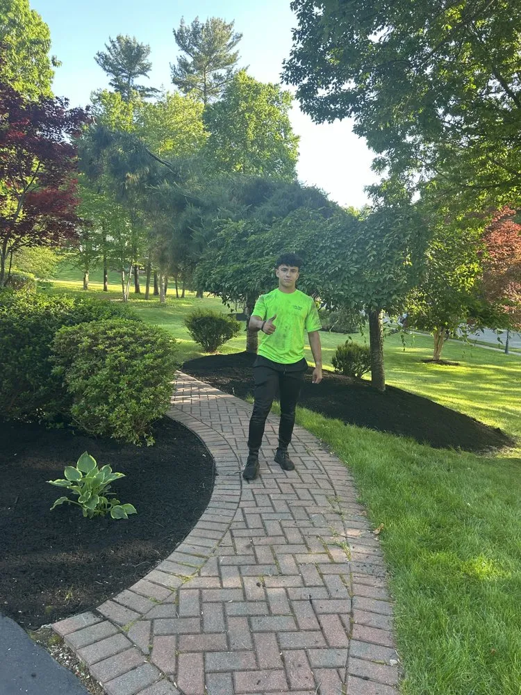 Custom yard cleanup service for year-round maintenance across Kingston, MA - Green Diamond Landscaping