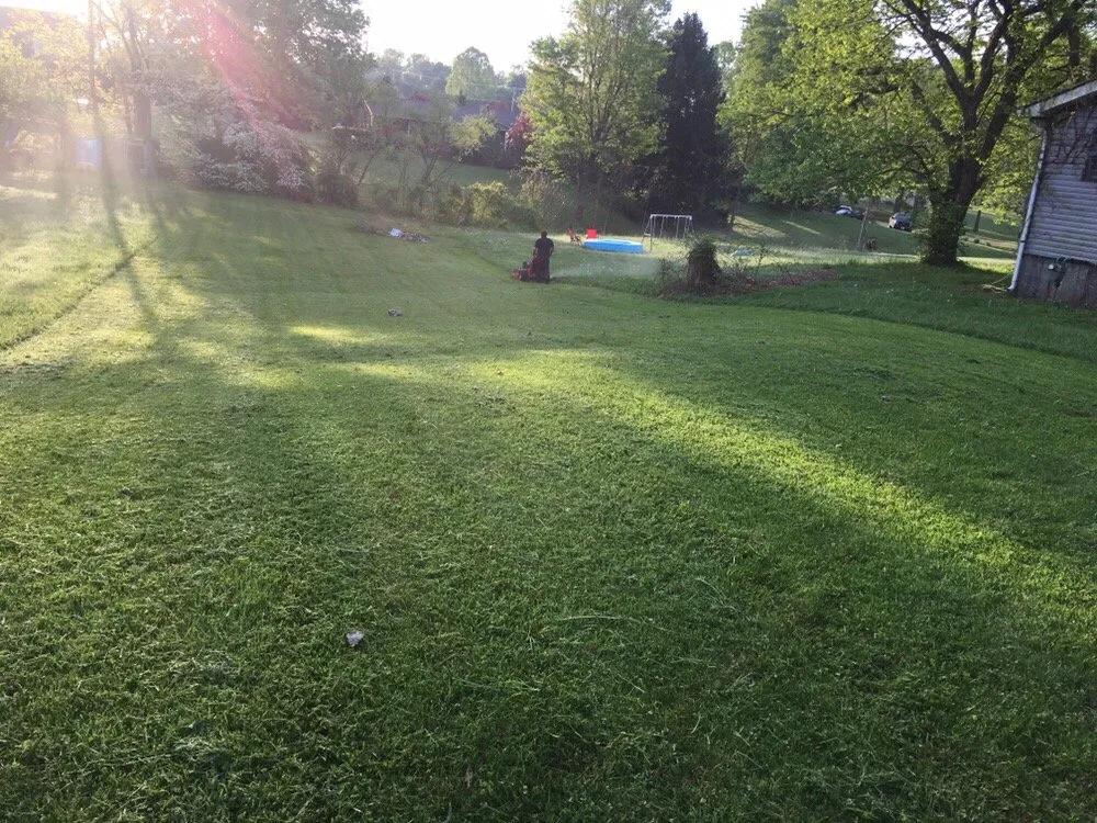 Professional lawn mowing service for outdoor upgrades in Hurricane, WV by Green earth landscapes