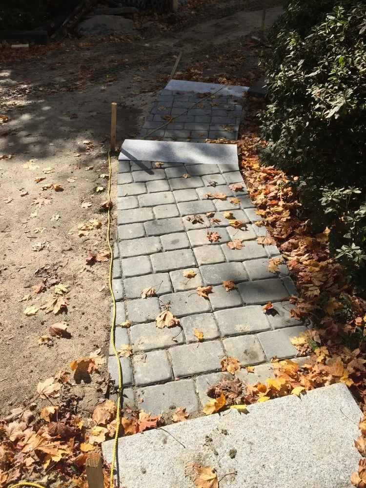 Top-rated landscaping services for homes in Dartmouth, MA by Green Earth Landscaping